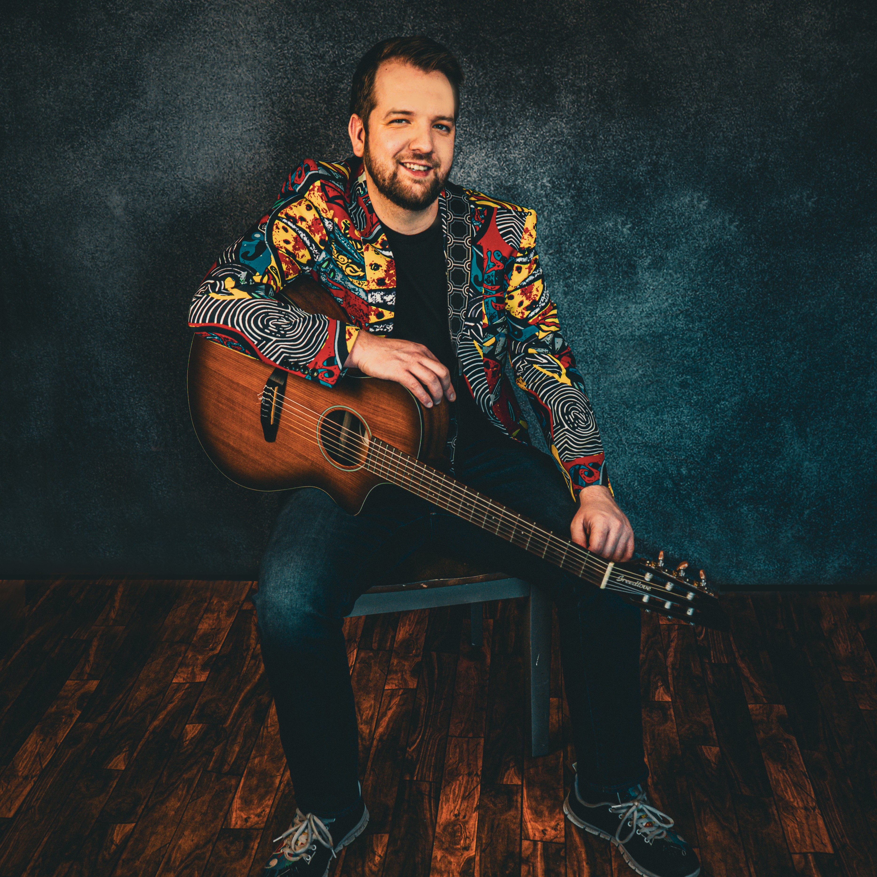 Joe Graf Kemmerling with a Guitar